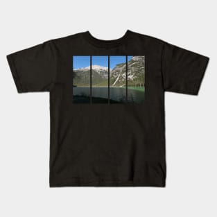 The fabulous alpine lake of Landro (Durrensee) in the Dolomites (Dobbiaco). Lovely place in the Italian Alps. Reflections in the water. Sunny spring day. Trentino Alto Adige Kids T-Shirt